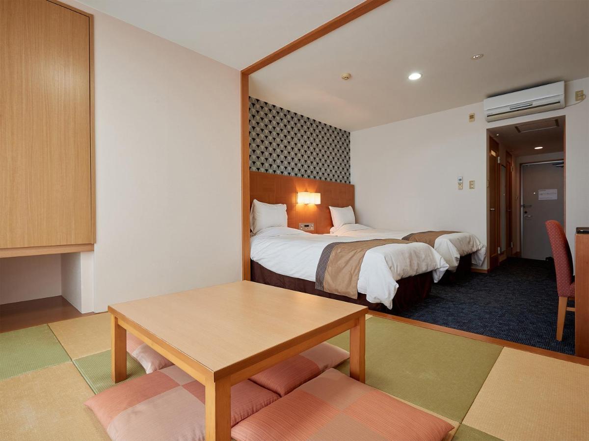 Hotel Murasakimura Yomitan Buitenkant foto