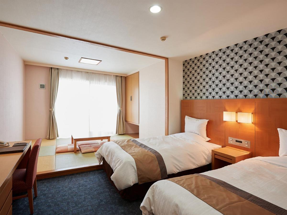 Hotel Murasakimura Yomitan Buitenkant foto