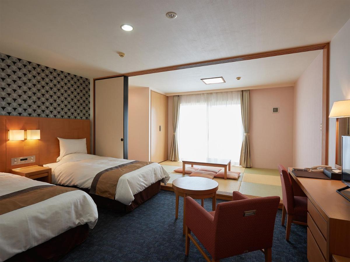 Hotel Murasakimura Yomitan Buitenkant foto