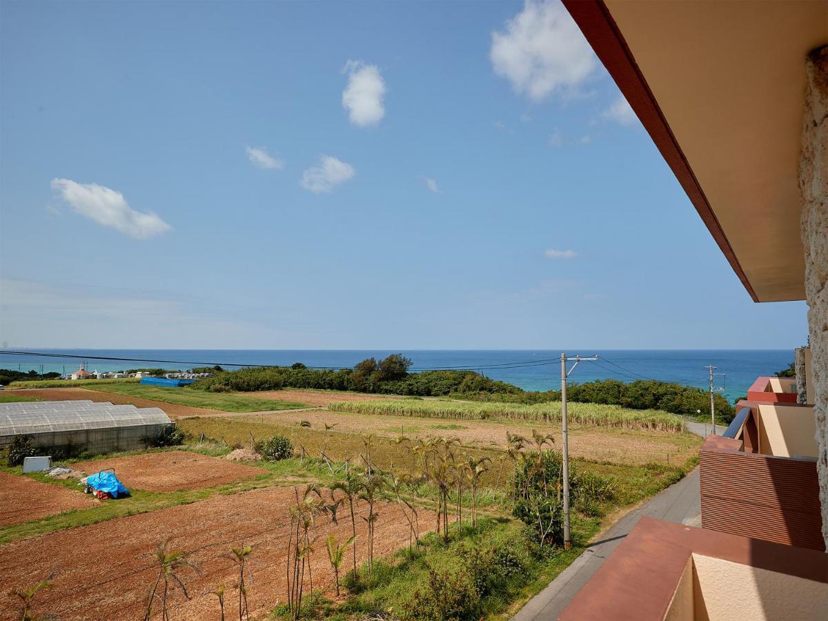 Hotel Murasakimura Yomitan Buitenkant foto