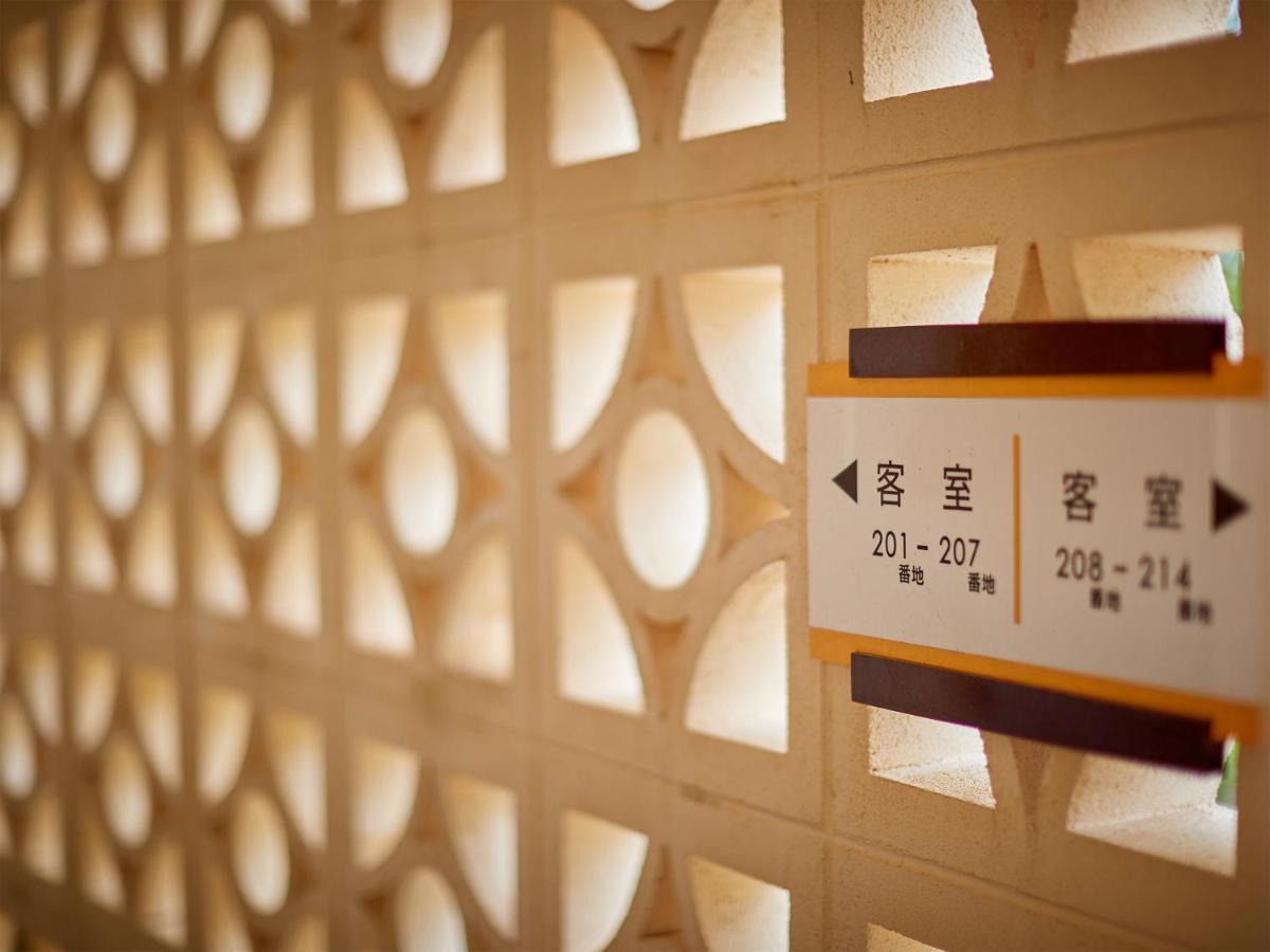 Hotel Murasakimura Yomitan Buitenkant foto