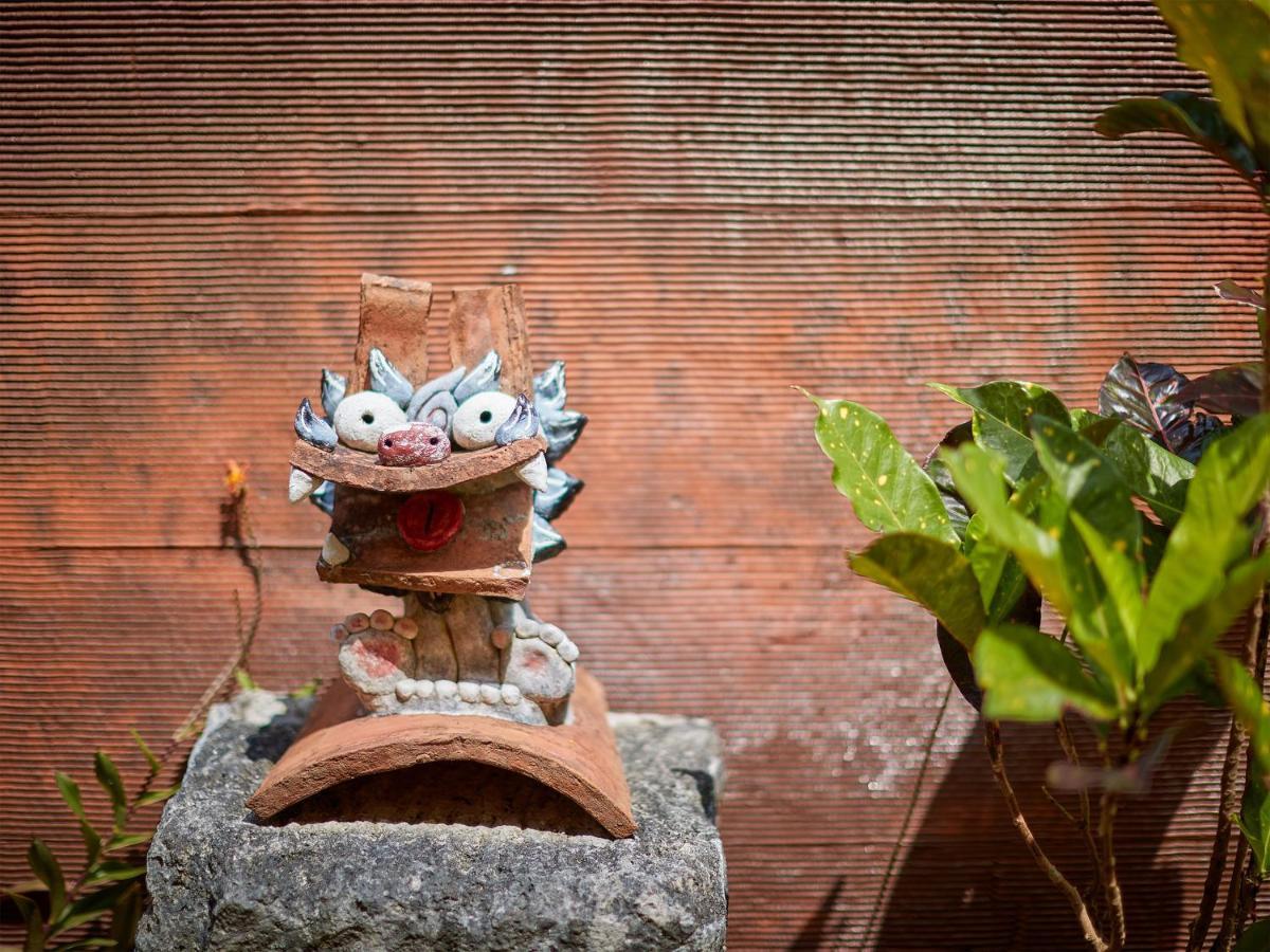 Hotel Murasakimura Yomitan Buitenkant foto