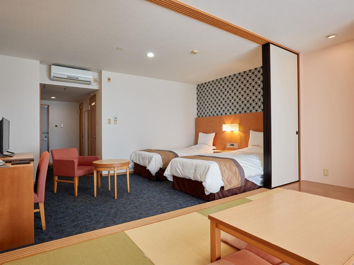 Hotel Murasakimura Yomitan Buitenkant foto